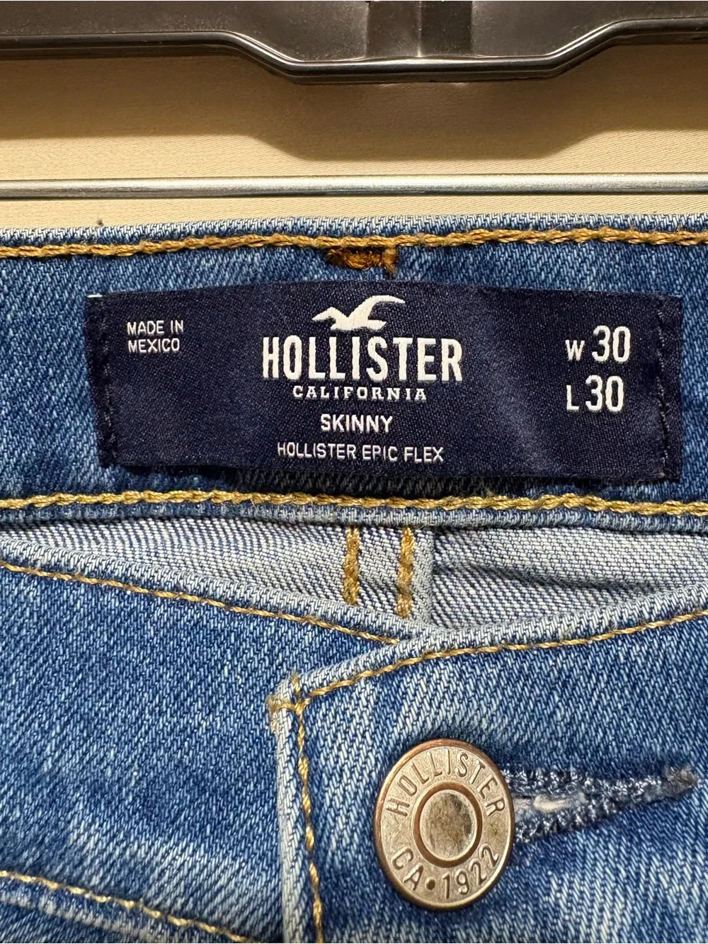 Hollister Men’s 30x30 Slim Skinny Jeans in Mid Wash Blue with Light Distressing
